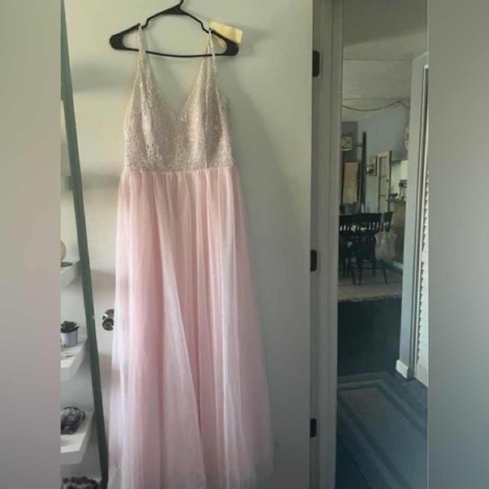 Pink bridesmaids dress
never worn never altered  
Tags still attached